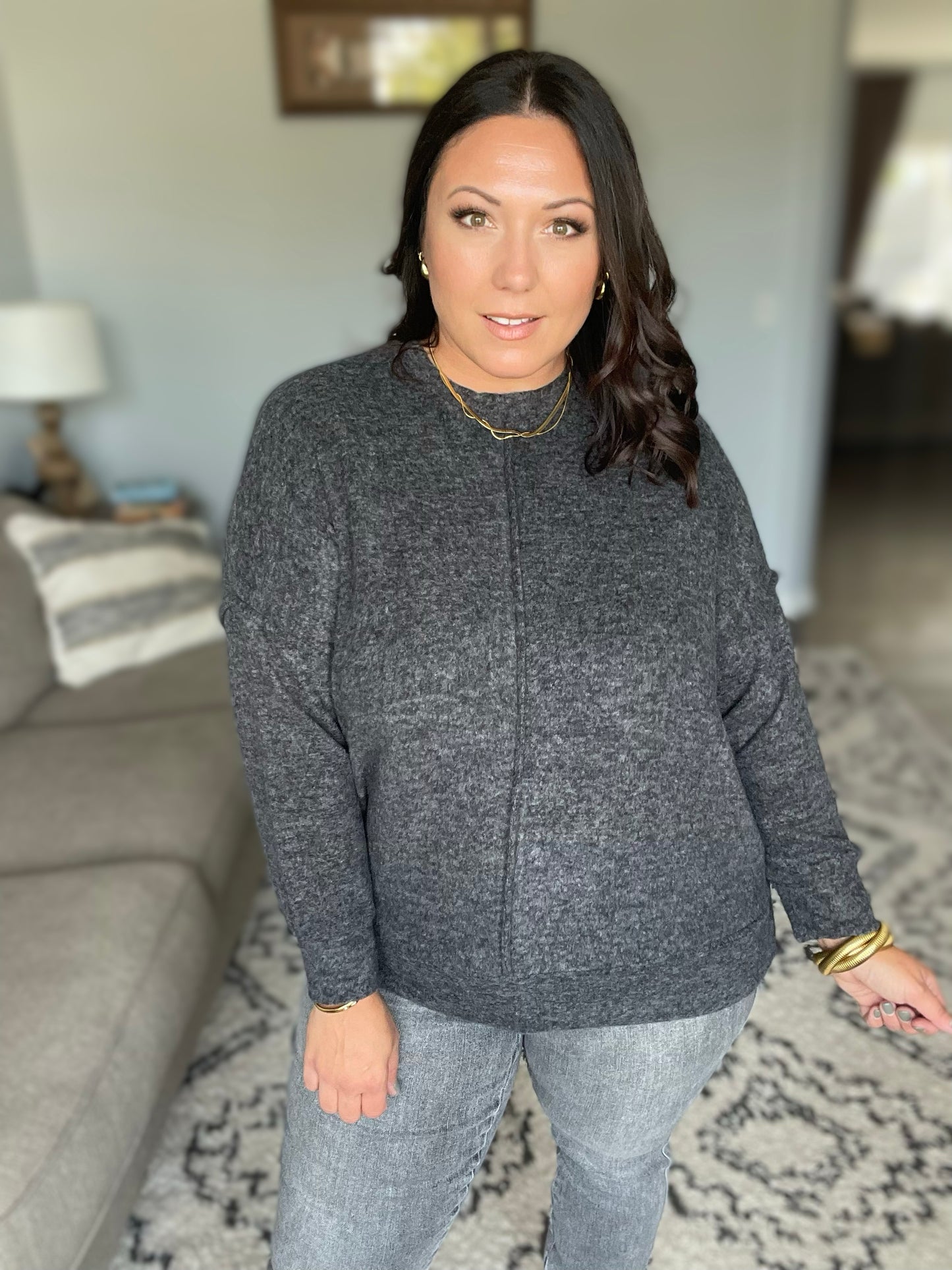 Lock Eyes Exposed Seam Melange Sweater in Heathered Black
