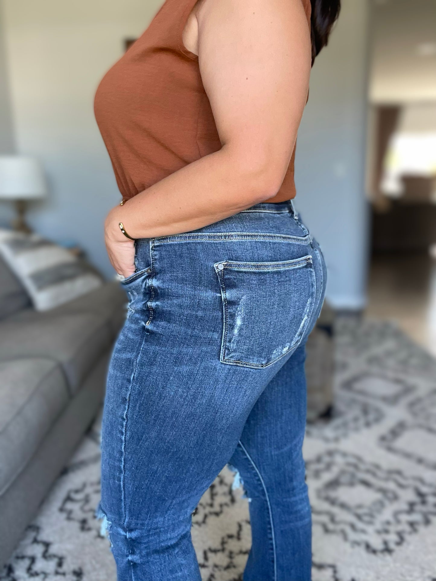 Gabriella Mid Rise Distressed Button Fly Flare