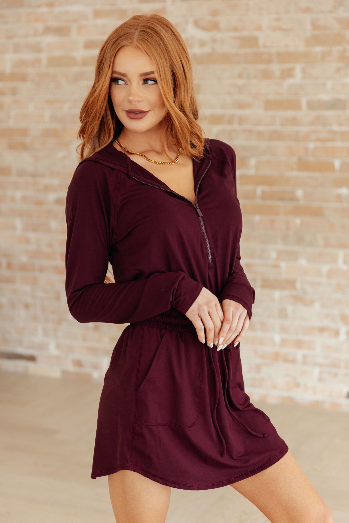 Getting Out Long Sleeve Hoodie Romper in Wine